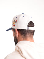 Gorra Unisex | Blanco con Visera Azul Oscuro y Bordado 1976