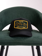 Gorra Unisex | Negra en Malla con Logo en Letras Negras